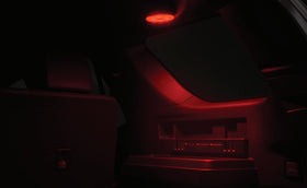 Toyota side storage LED lantern in use at night with bright light aiding roadside tasks