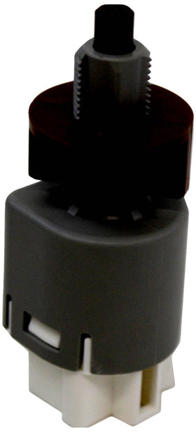 Toyota genuine stoplamp switch front view showing connector and mounting tabs for correct fit