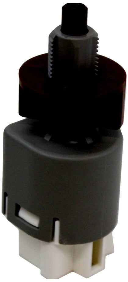 Toyota genuine stoplamp switch front view showing connector and mounting tabs for correct fit