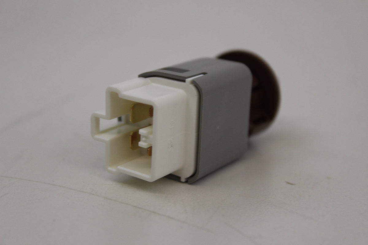 Toyota stoplamp switch installed near brake pedal demonstrating factory fit and reliable activation