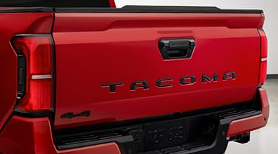 Toyota Tacoma tailgate insert front view showing flat black finish and clean OEM fit
