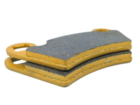 Traild pad beside ruler for size comparison and straightforward replacement