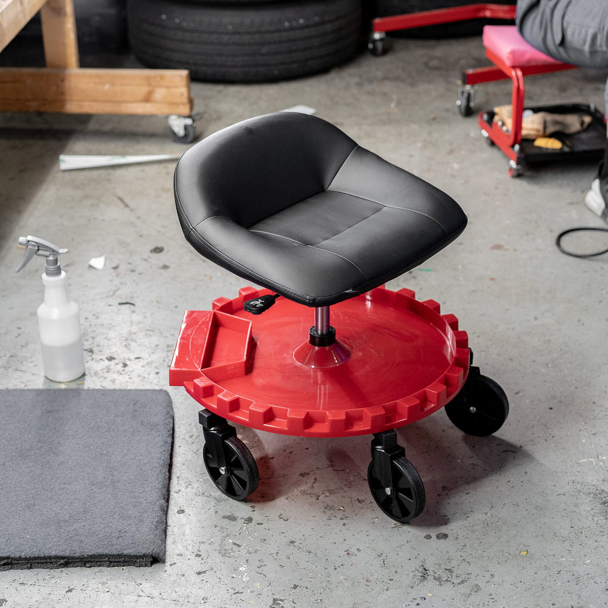 Traxion caster detail showing 5-inch all-terrain wheels for smooth rolling