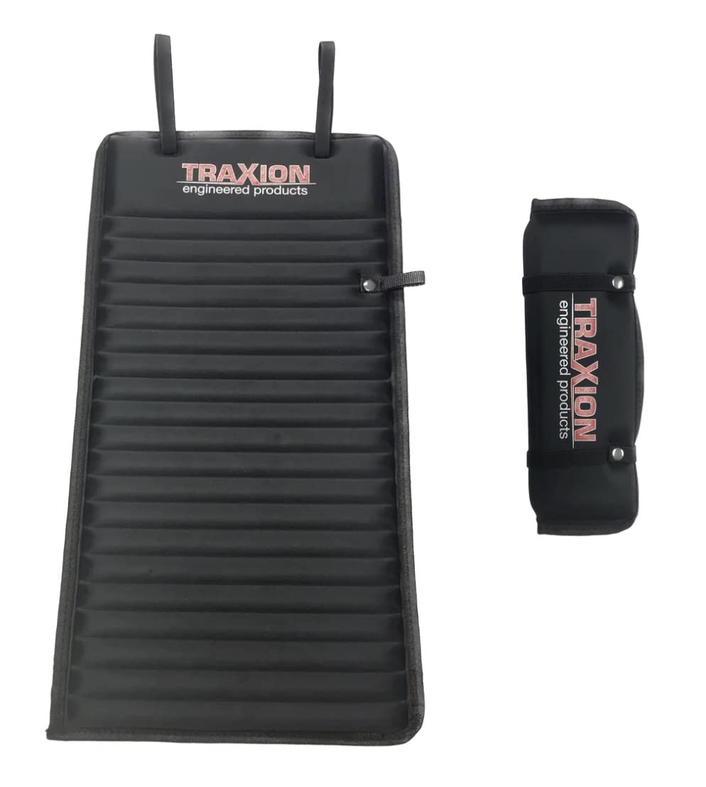 Traxion Versa Mat Mini rolled up with elastic band for compact portable storage