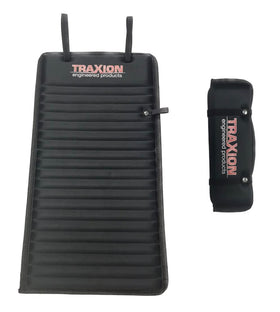 Traxion Versa Mat Mini rolled up with elastic band for compact portable storage