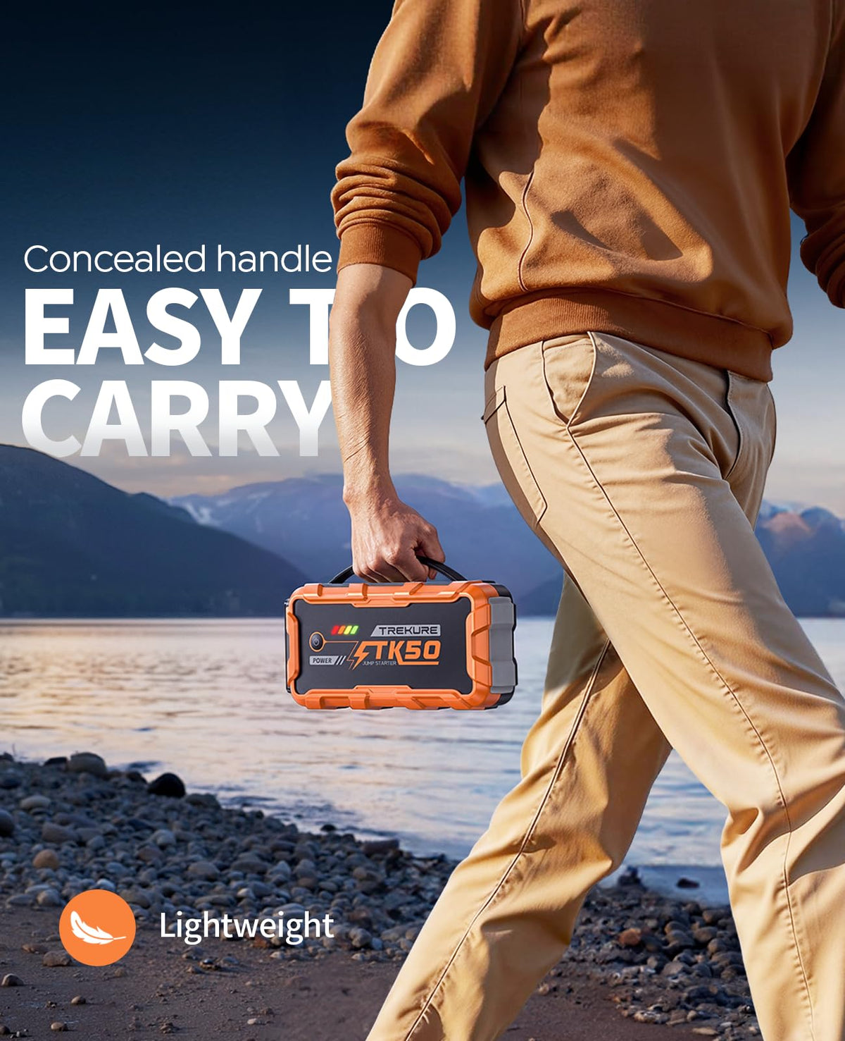 TREKURE jump starter connected to car battery restarting engine quickly