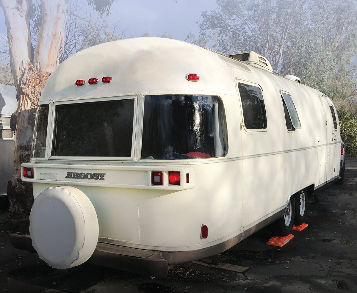 Tri-Lynx block placed under RV wheel showing improved level and safety