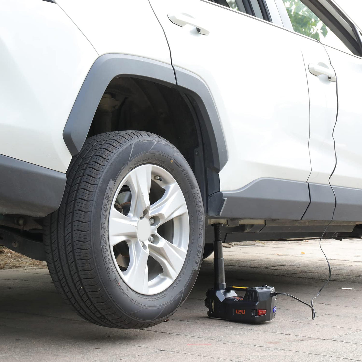 Trihelper LED light illuminating wheel well, improves visibility for night repairs
