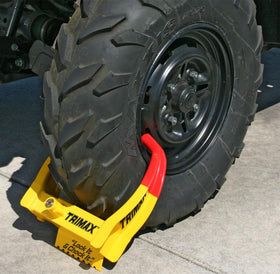 Trimax TCL75 next to a ruler for scale illustrating size fit range