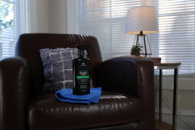 TriNova cleaned living room couch in lifestyle scene showing refreshed synthetic leather