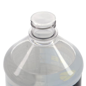 TSI Supercool being poured into a vacuum pump demonstrating cleaner, non-misting refill