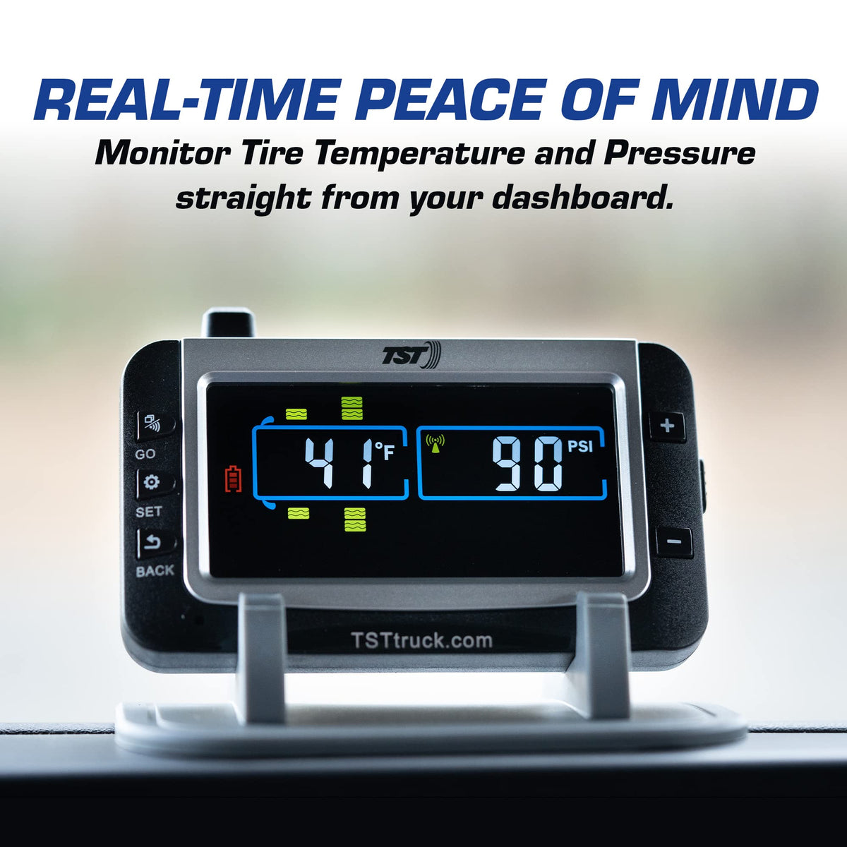 TST monitor mounted on dash with rubber mount providing stable viewing