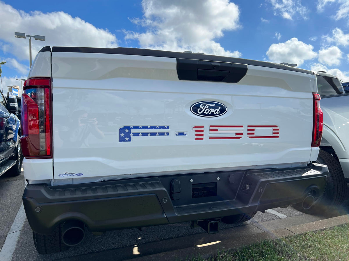 TufSkinz front view of F-150 tailgate emblem showing clean OEM fit and improved appearance
