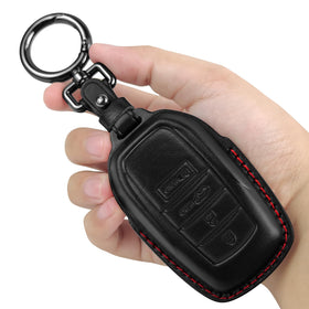 Tukellen front view of black leather key fob cover with red line showing protection and style