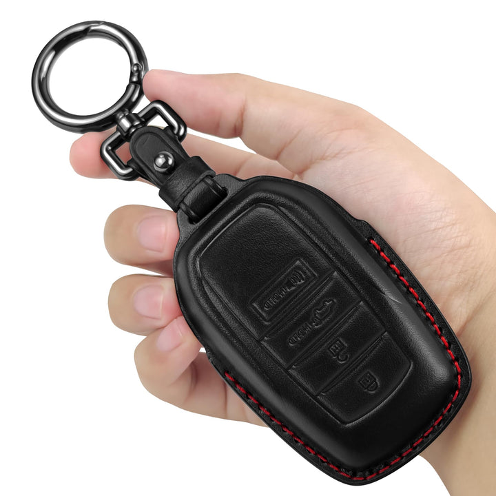 Tukellen front view of black leather key fob cover with red line showing protection and style