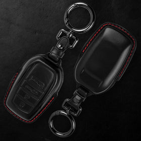 Tukellen key fob in hand showing scale and improved grip for easier everyday use