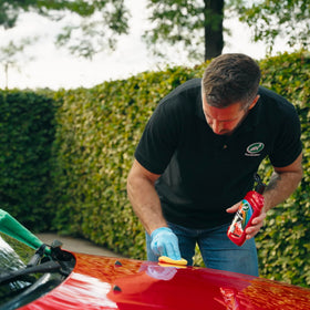 Turtle Wax before and after red hood showing restored depth and gloss