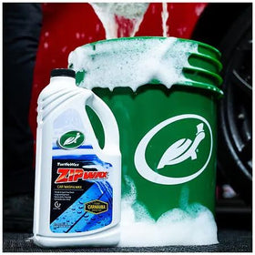 Turtle Wax close-up foam lifting dirt, demonstrating improved cleaning action