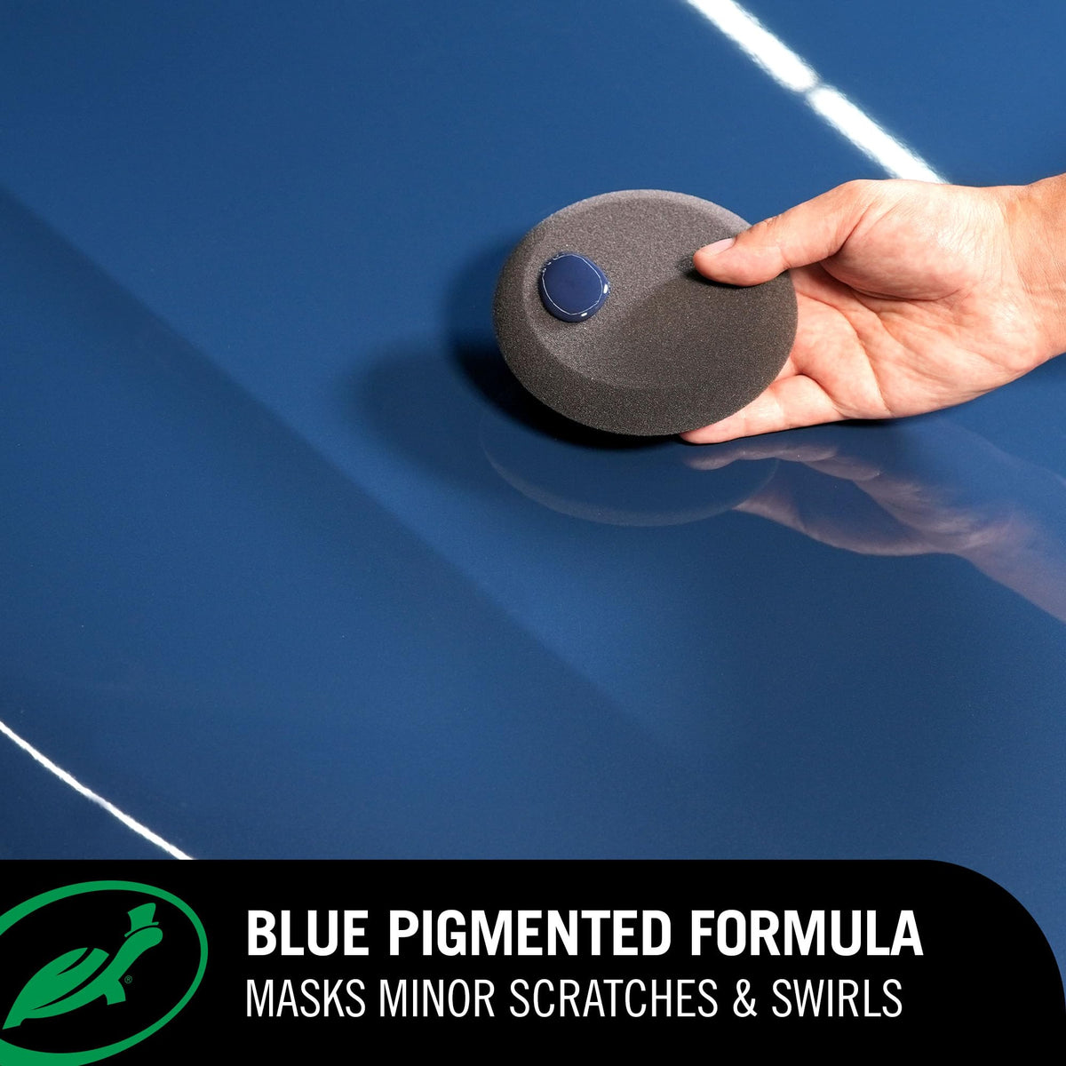 Turtle Wax bottle beside hand demonstrating convenient 500ml size