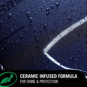 Turtle Wax detailer sprayed on paint highlighting slick finish