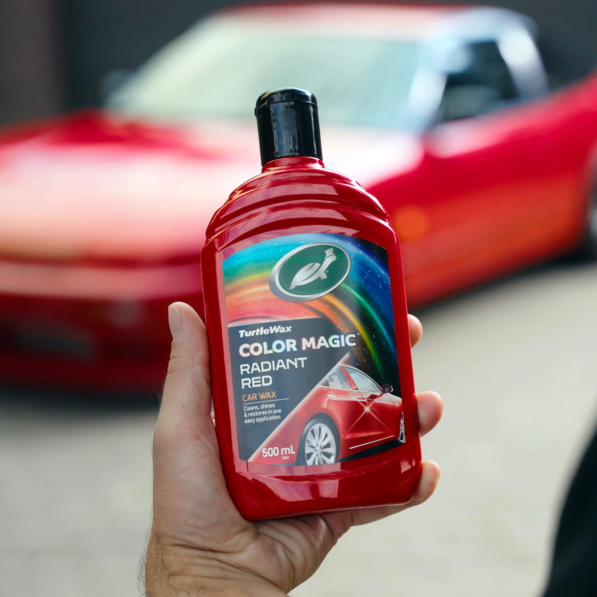 Turtle Wax 500ml bottle in hand for scale and convenient size