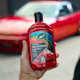 Turtle Wax 500ml bottle in hand for scale and convenient size
