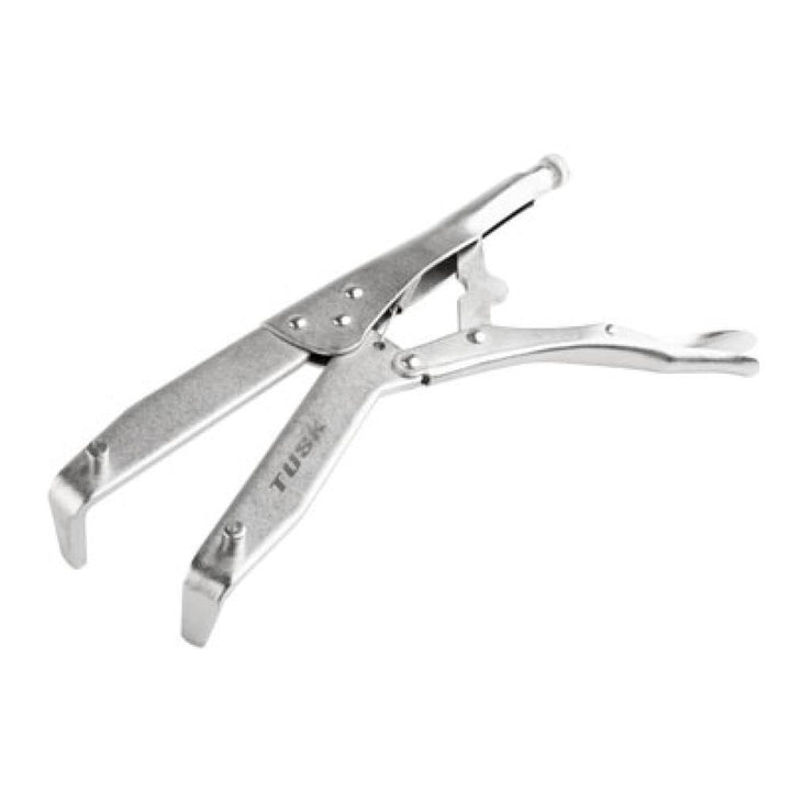 TUSK clutch holding tool front view showing full adjustable arms and solid steel build for reliability