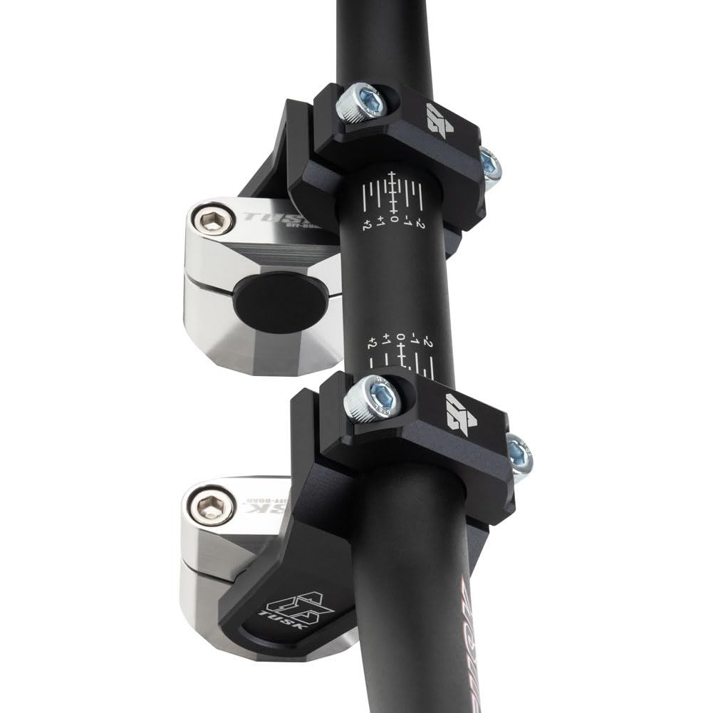 TUSK risers on dirt bike in trail setting improving handling and comfort