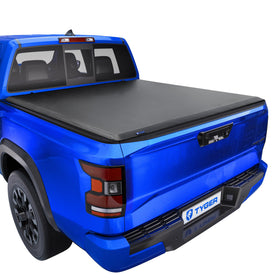 Tyger Auto front view on Nissan Frontier showing sleek cover for protection