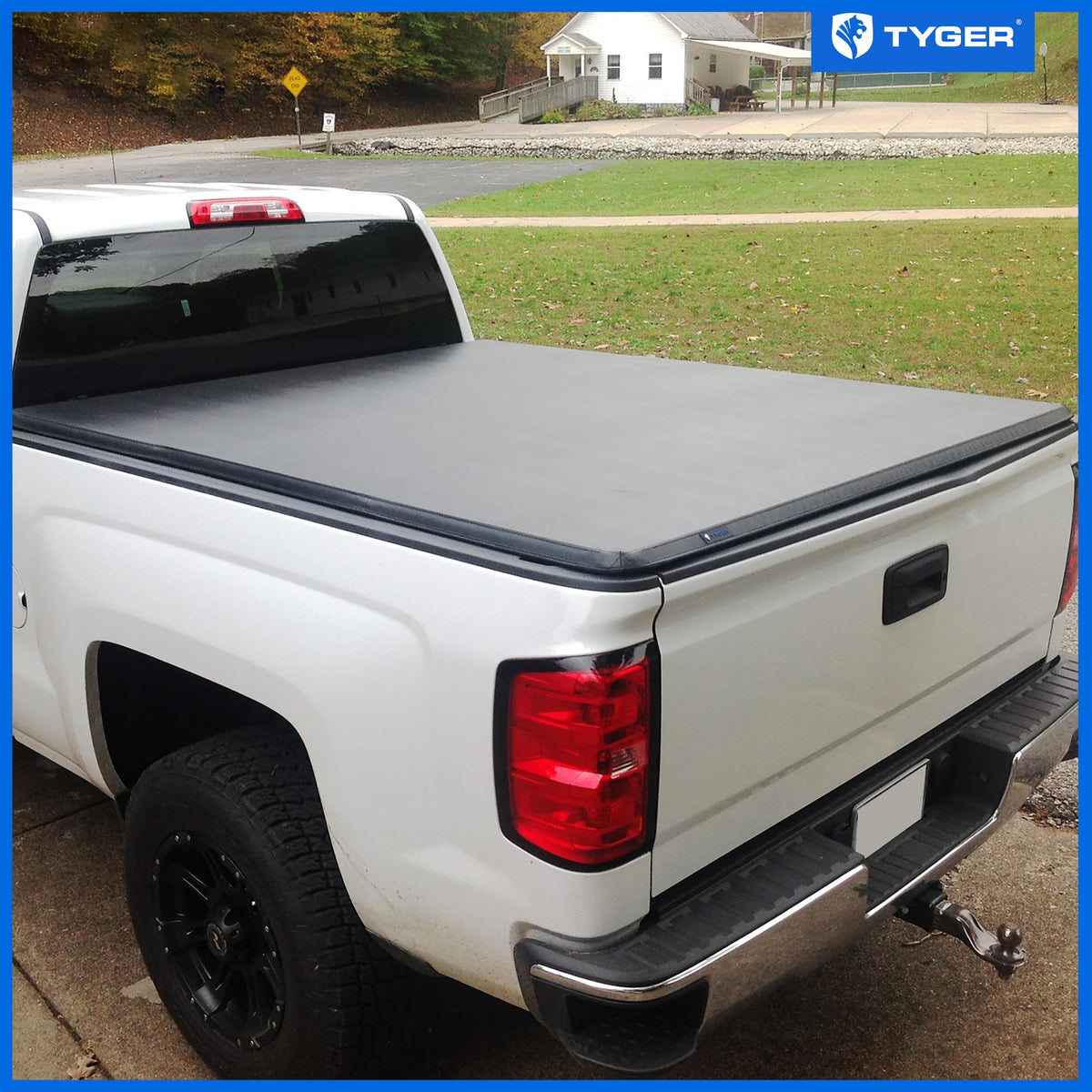 Tyger Auto tri-fold cover folded forward demonstrating quick full-bed access benefit