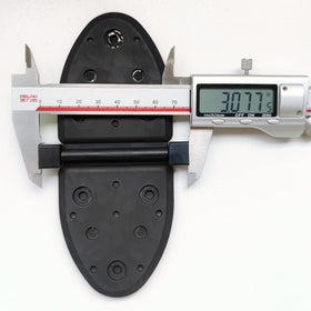UANOFCN flapper beside ruler for scale demonstrating correct dimensions