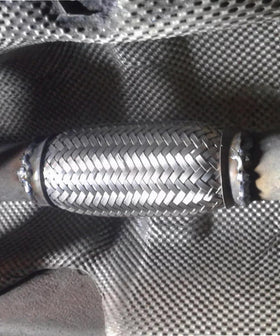 UNLRAE flex pipe on a workshop bench illustrating ready-to-install automotive replacement