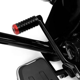 Unrestricted Walk shifter peg on motorcycle in ride setting highlighting custom appeal