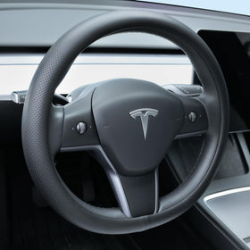 Uxcer front view showing black steering wheel cover on packaging benefiting visual confirmation