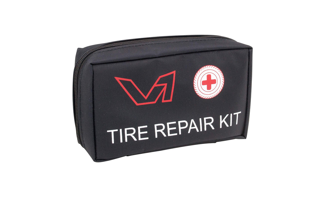V1 Motor kit in use repairing a motorcycle tire to restore mobility
