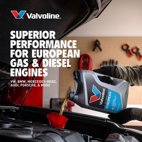 Valvoline bottle beside car key showing correct 5-quart capacity convenience