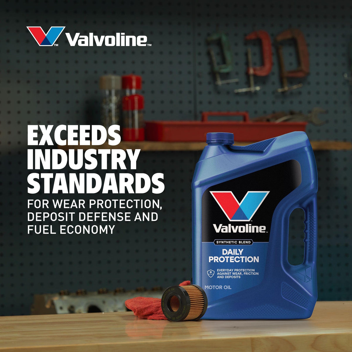 Five-quart Valvoline jug beside a hand showing scale and convenient refill size