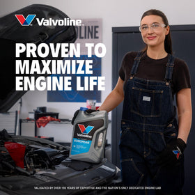 Valvoline bottle in garage with sportscar showing premium European fitment