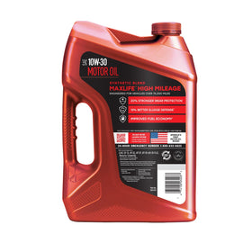 Close-up of Valvoline oil being poured showing smooth flow and controlled application
