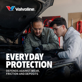 Valvoline bottle next to engine bay indicating compatibility and maintenance benefit