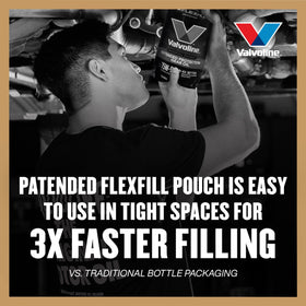 Hands holding Valvoline pouch demonstrating easy use in tight spaces