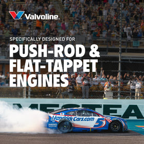 Valvoline VR1 bottle beside a performance engine illustrating engine protection use