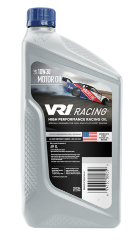 Pouring Valvoline VR1 10W-30 into an engine bay demonstrating easy application