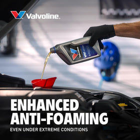 Case of six Valvoline VR1 one-quart bottles packed for workshop storage and convenience