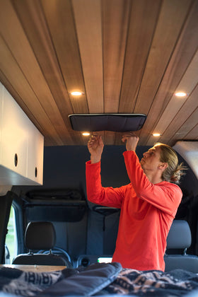 VanEssential lifestyle van interior showing cooler cabin comfort