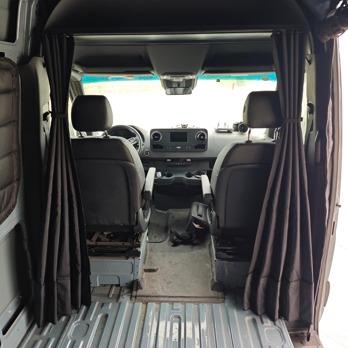 VANNCAMP curtain rolled up and strapped for tidy storage benefit