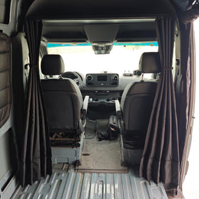 VANNCAMP curtain rolled up and strapped for tidy storage benefit