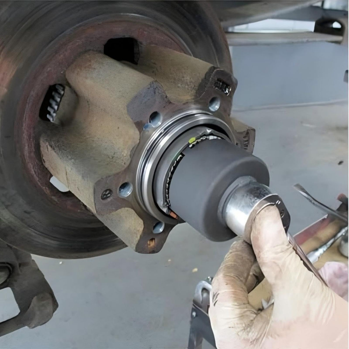 VCC socket in use removing a rear axle nut showing safer, non-slip operation