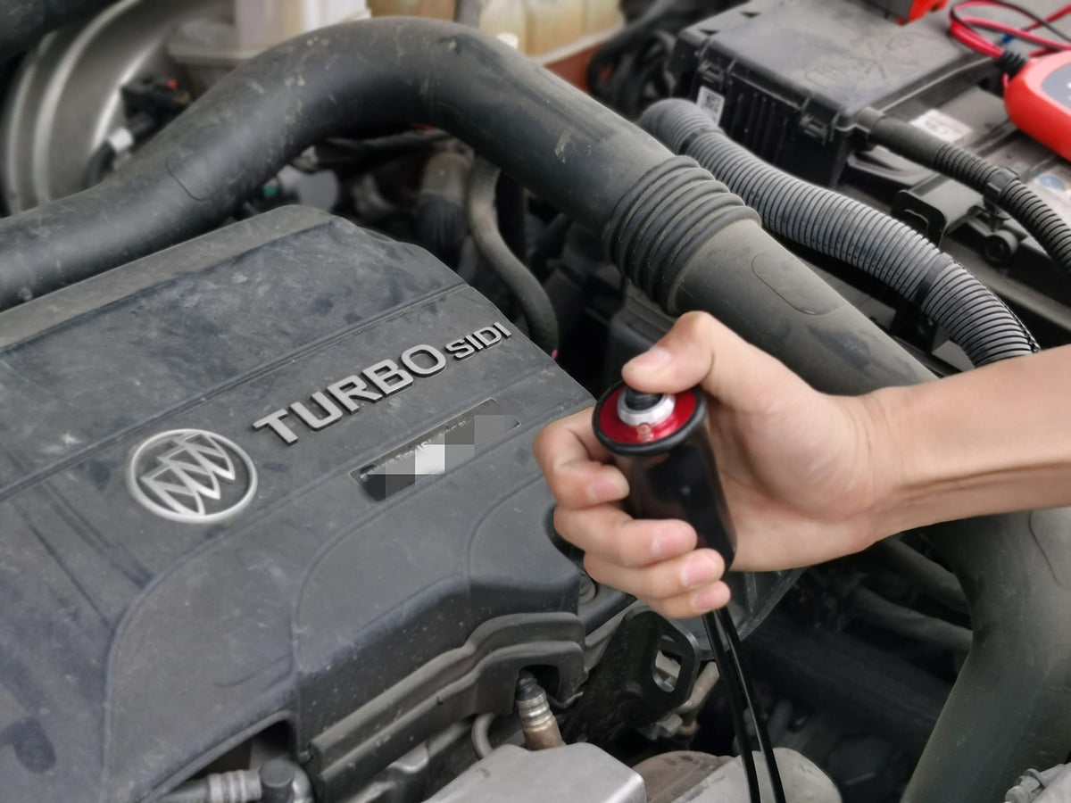 VCC starter switch held in hand showing compact size and portable benefit
