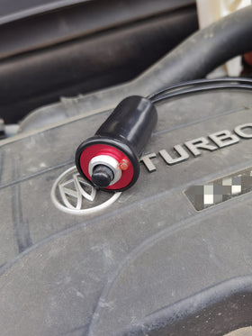 VCC starter switch in-use under hood enabling safe remote engine cranking